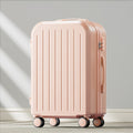 Pink suitcase with wheels on a light gray background