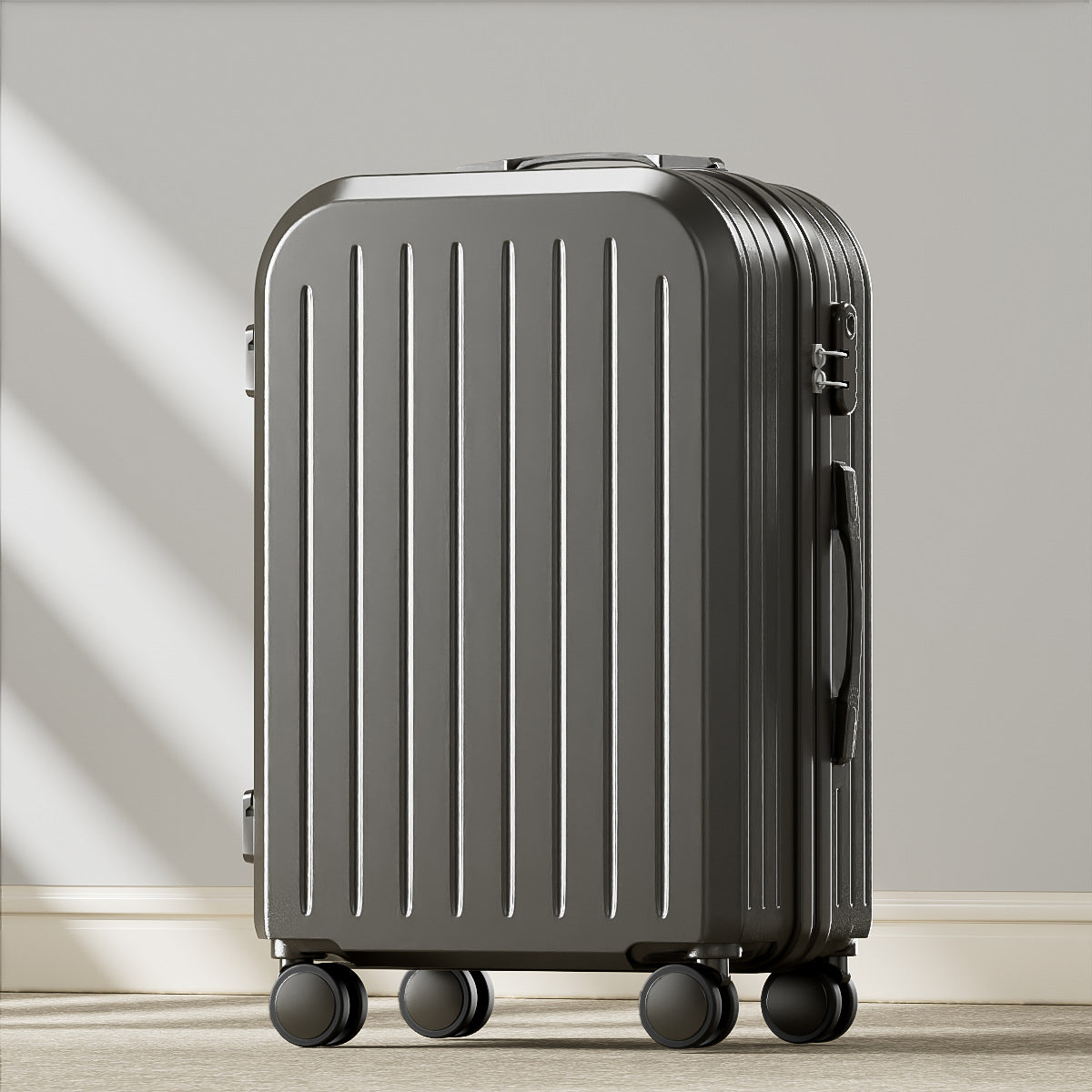 Gray suitcase with wheels on a light wooden floor and gray wall background
