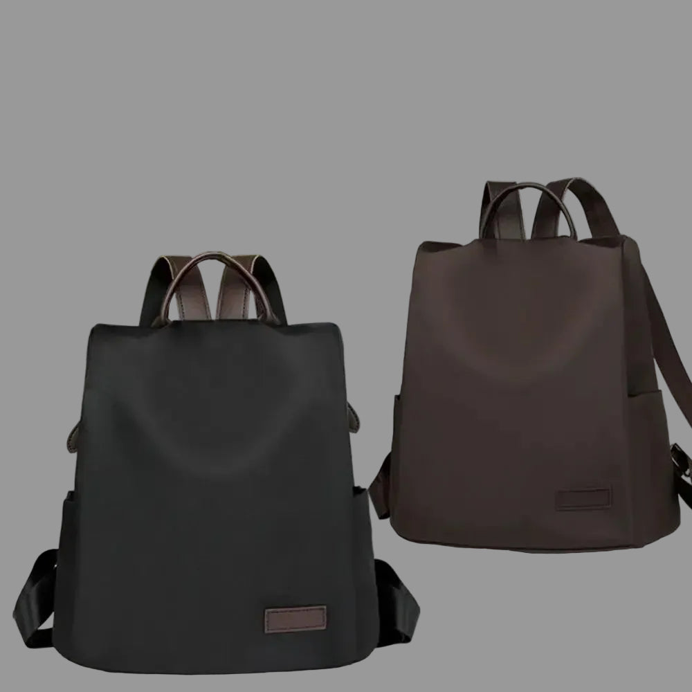 Two black backpacks on a white surface with text describing their features.