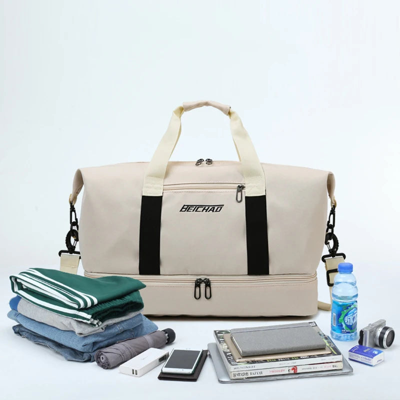 Beige duffel bag with travel items on a white background