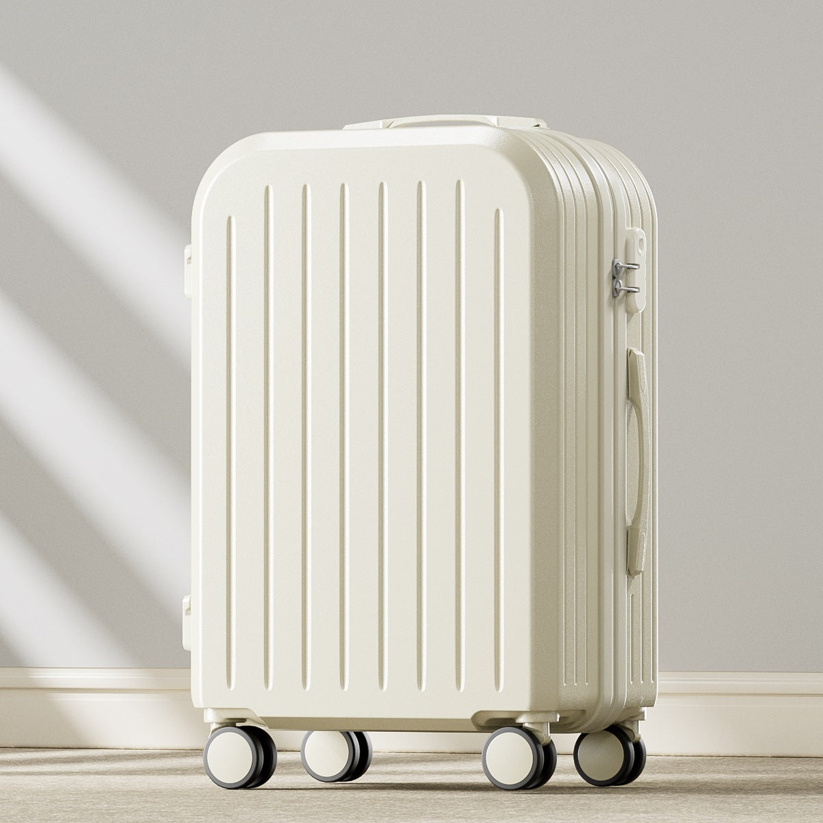 White suitcase with wheels on a light wooden floor and gray wall background